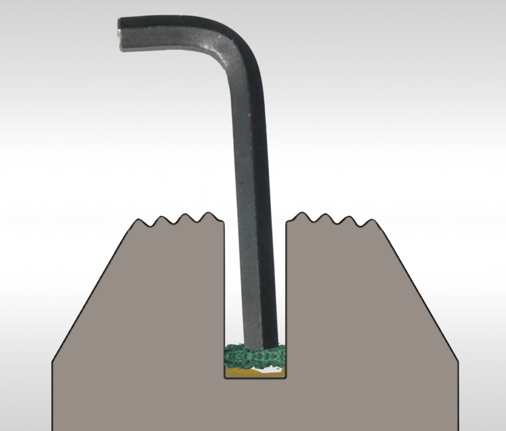 Cleaning knife and anvil slots on sealing jaws