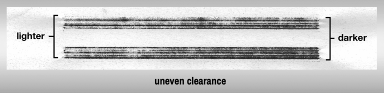 sealing jaw carbon impression shows uneven clearance adjustment