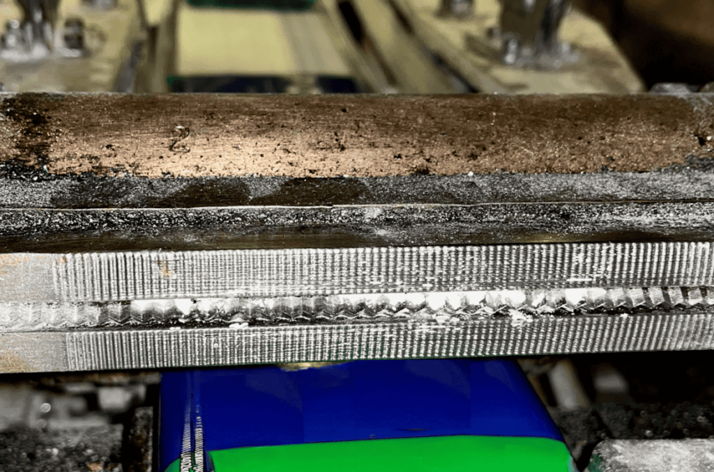 Product contamination on flow wrapper sealing jaws