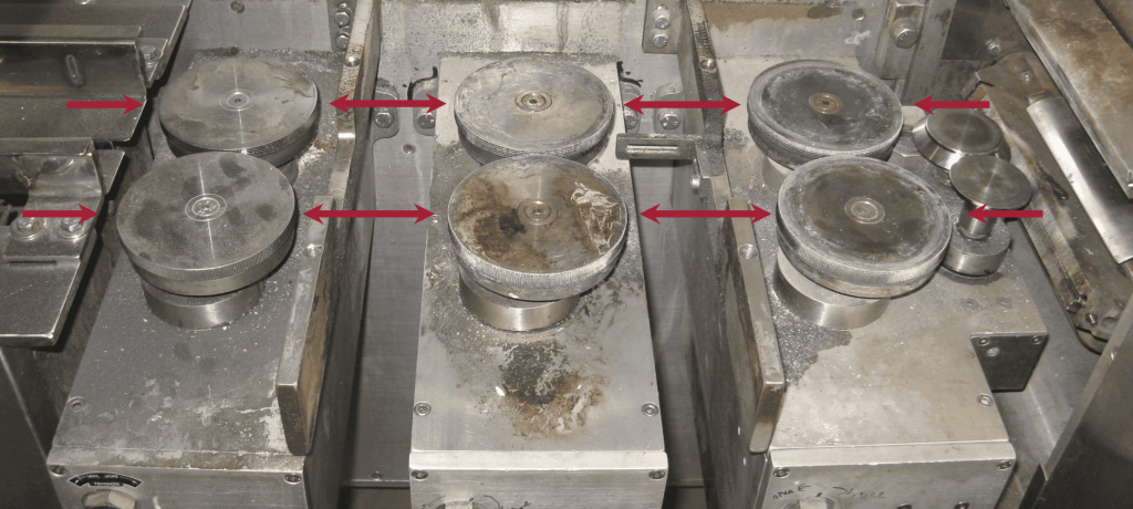 Checking fin wheel bearings on a flow wrapper